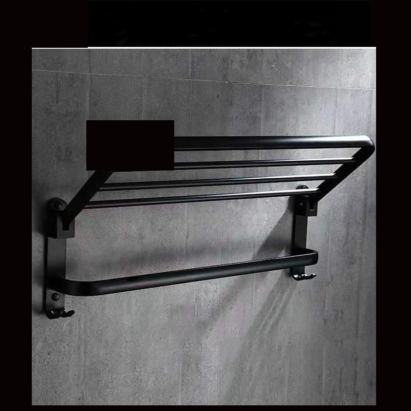 Folding bathroom shelf made of perforated aluminum