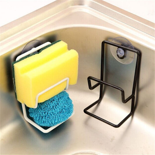 Kitchen sink with suction cup for sponge